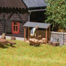 Busch 1869 Holz stapeln H0